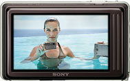 Máquina digital Sony Cyber-shot DSC-TX5 - Costas - Cortesia da Sony, edição Câmera versus Câmera